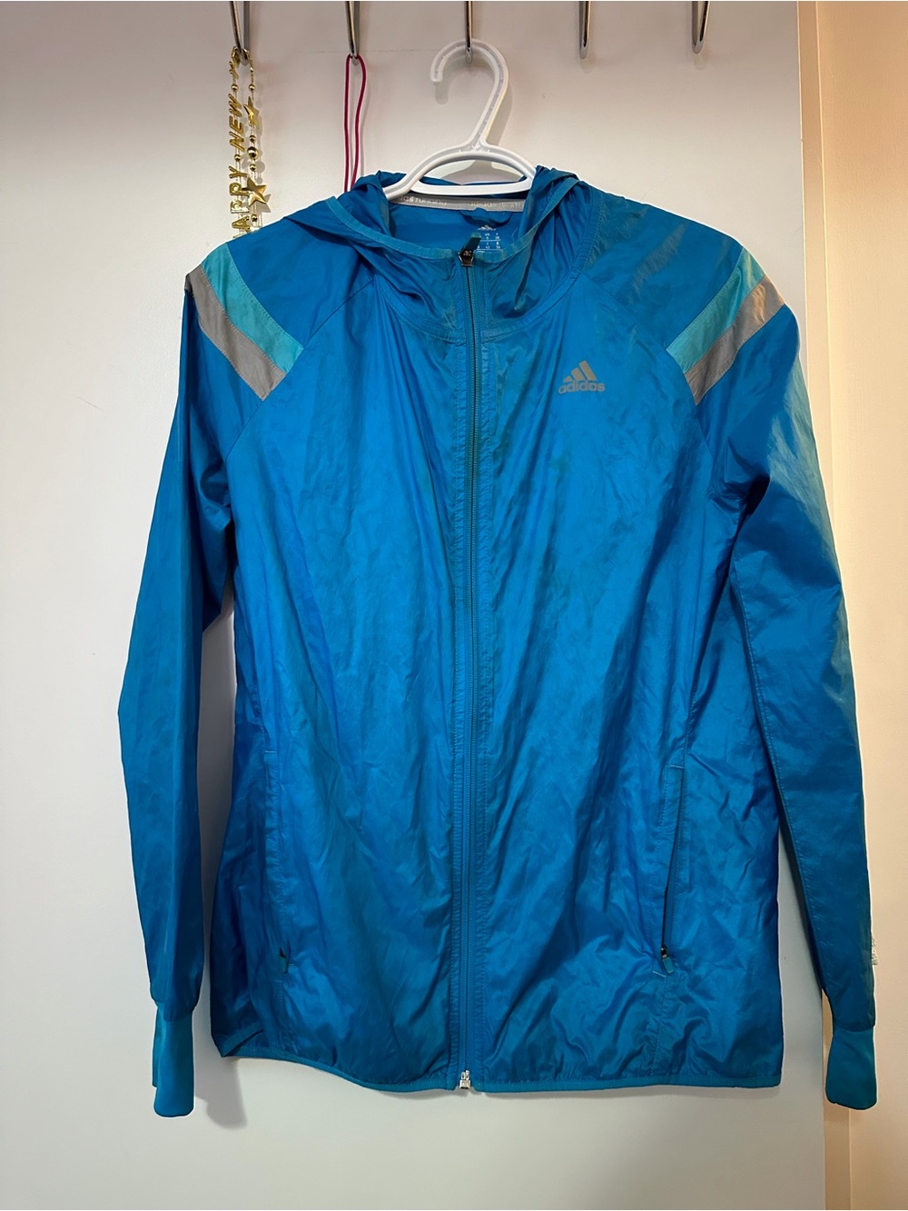 Adidas women’s Blue Hooded Windbreaker Jacket